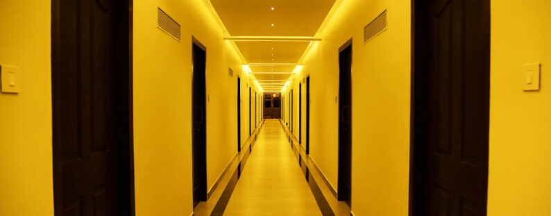 hotel corridor with rooms